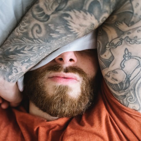 Addiction_LoveAvoidance_Secondary_2 half of guys head wrapped by his tatooed arm