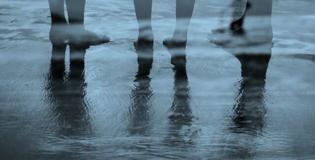feet on wet sand