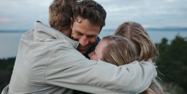 4 people group hugging