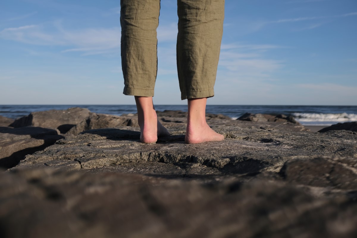 picture of somebody standing on a rock